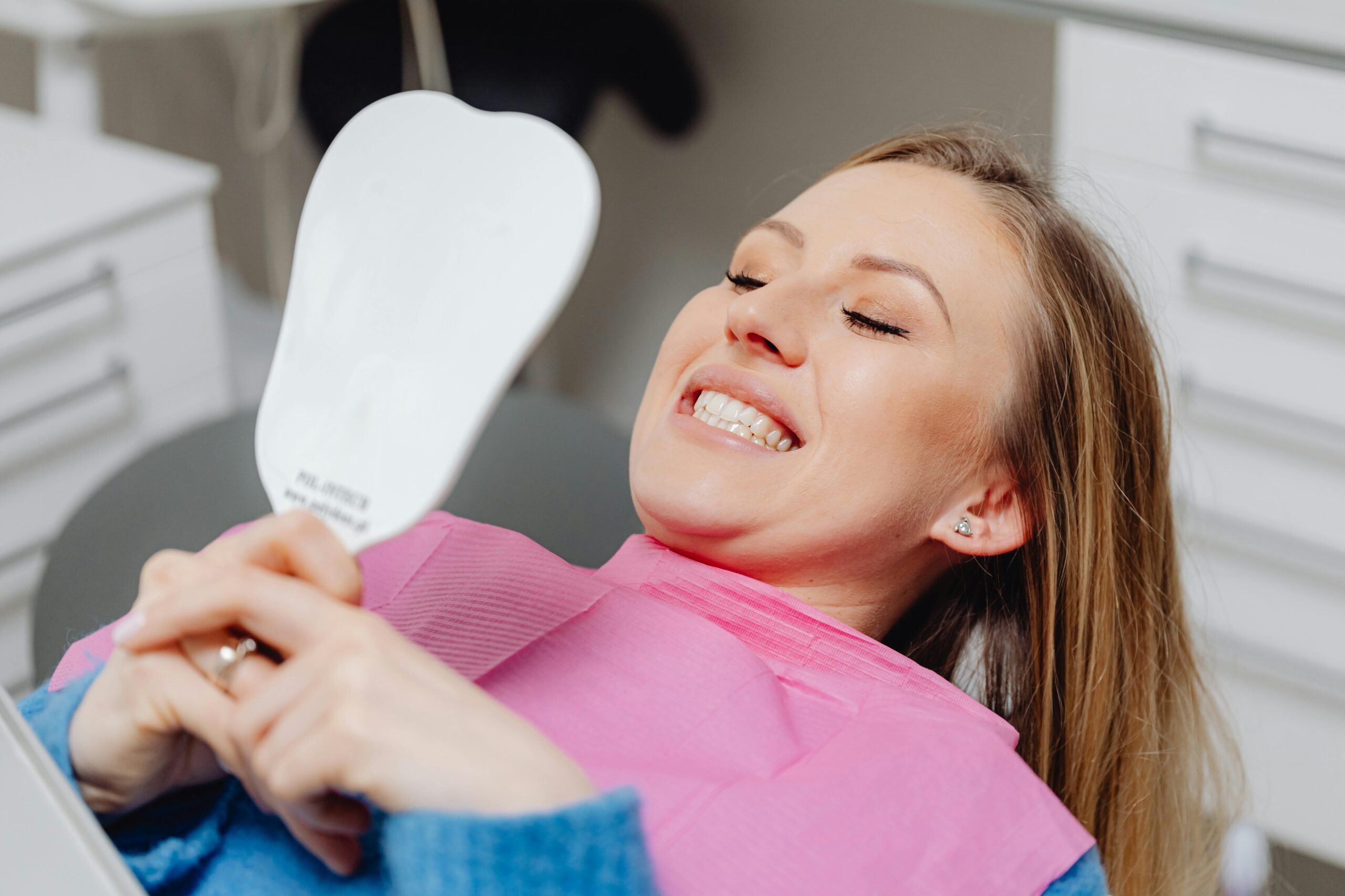 woman smiling after a dental check up